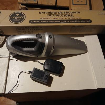 Regalo retractable baby gate - never installed with a handheld vacuum crumbs cleaner!