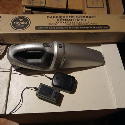 Regalo retractable baby gate - never installed with a handheld vacuum crumbs cleaner!