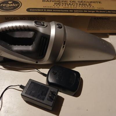 Regalo retractable baby gate - never installed with a handheld vacuum crumbs cleaner!