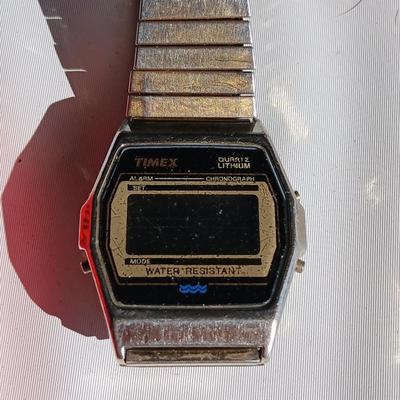 Vintage digital Timex watch, Timex stopwatch and a Kartenmesser opisometer made in Germany