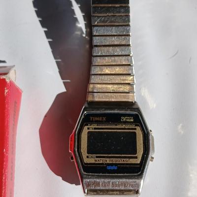 Vintage digital Timex watch, Timex stopwatch and a Kartenmesser opisometer made in Germany