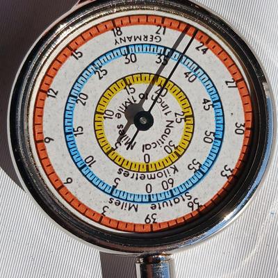 Vintage digital Timex watch, Timex stopwatch and a Kartenmesser opisometer made in Germany