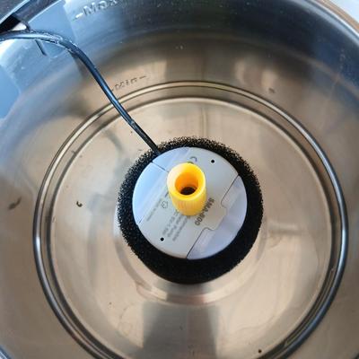 Pet drinking fountain - an automatic water / food dispenser and three little collars with bells -