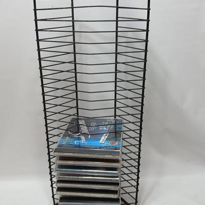 Music on CD - mostly Garth brooks - with an organizing stand