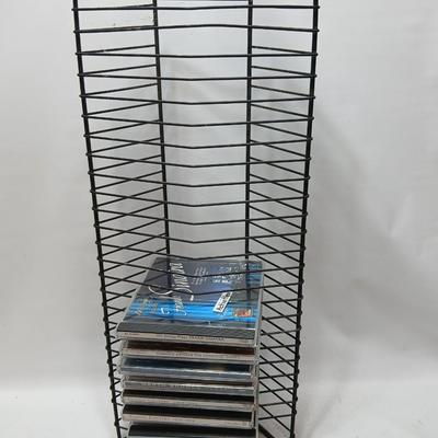 Music on CD - mostly Garth brooks - with an organizing stand