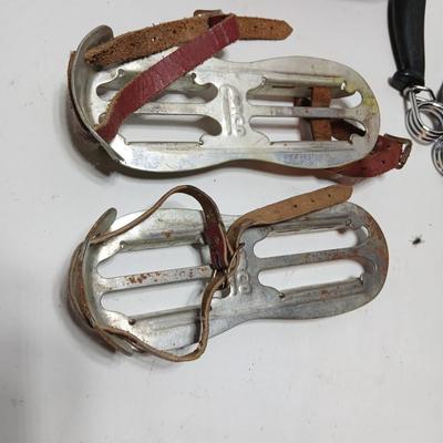 Vintage sporting - Antique metal ice skates, old football and a softball mitt
