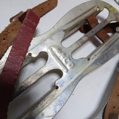 Vintage sporting - Antique metal ice skates, old football and a softball mitt