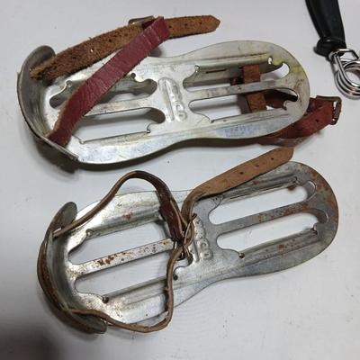 Vintage sporting - Antique metal ice skates, old football and a softball mitt