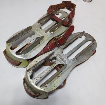 Vintage sporting - Antique metal ice skates, old football and a softball mitt
