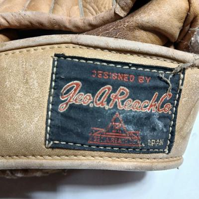 Vintage sporting - Antique metal ice skates, old football and a softball mitt