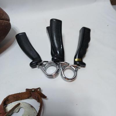 Vintage sporting - Antique metal ice skates, old football and a softball mitt