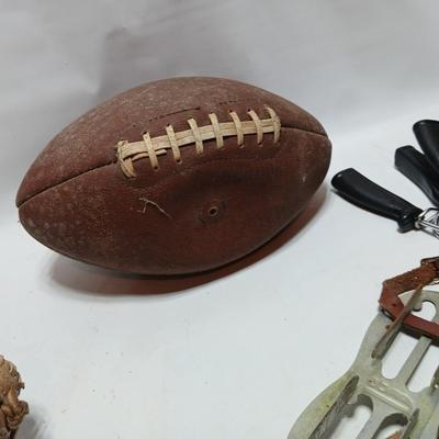Vintage sporting - Antique metal ice skates, old football and a softball mitt