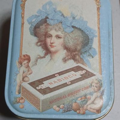 Rare "Winter Skate Southern Belle Air Brushed Lith" Donald Art Company, Inc- Convex wall art picture - and a vintage Nabisco Tin