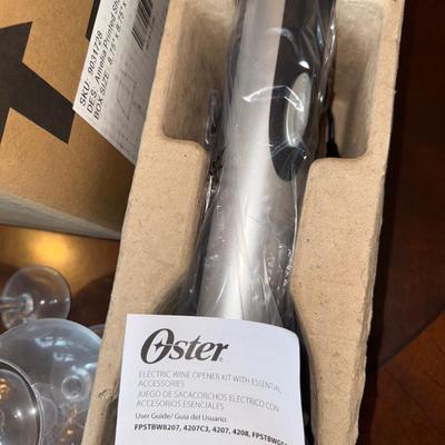 Sale Photo Thumbnail #976: M26-wine glasses and wine opener