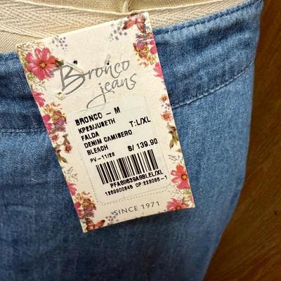 Sale Photo Thumbnail #389: Wrap Around design denim skirt in good condition.