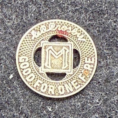 Sale Photo Thumbnail #421: Slightly smaller than a US dime. Rare, in very good condition. Minneapolis Street Railway Company ran from 1873 until about 1950.  This token is likely from the 1940's.