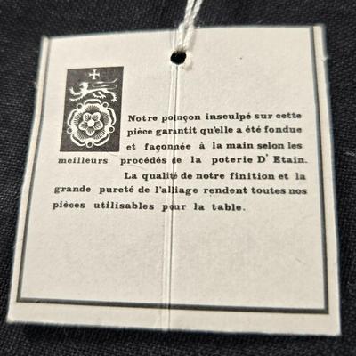 Sale Photo Thumbnail #108: This auction lot is for a Pair of Polished Pewter Knife Rests. This a nicely executed Pair of Knife Rests.  They were produced by L'Etain A La Rose.  These were originally sold in fine china shops.  They are very useful in keeping used knives off of the f