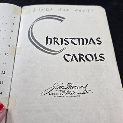 Sale Photo Thumbnail #105: This auction lot is for Vintage Music Booklets Used as Advertising.  This is a set of 2 Vintage Music Booklets Used as Advertising.  The Christmas Carols booklet was handed out by John Hancock Mutual Life Insurance Co. 1956.  The "Lullaby" booklet was fro