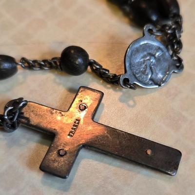 Sale Photo Thumbnail #90: This auction lot is for a Dark Grey Beaded Rosary.  This beaded rosary has France stamped into the back of the cross.  It is in very good condition, Appears to be quite vintage