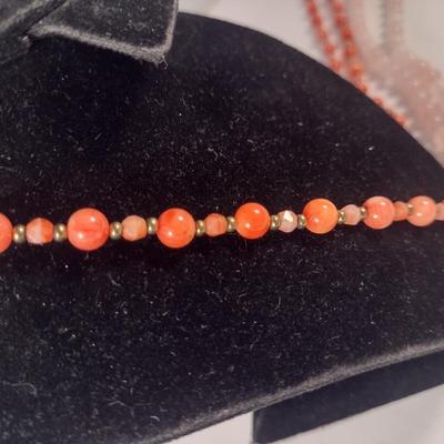 Sale Photo Thumbnail #1067: Pair of Hand Strung Stone Bead Necklaces (#6)