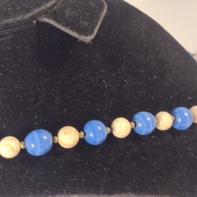 Sale Photo Thumbnail #1079: Pair of Hand Strung Stone Bead Necklaces (#7)