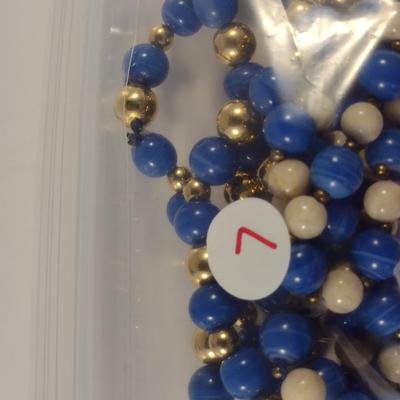 Sale Photo Thumbnail #1082: Pair of Hand Strung Stone Bead Necklaces (#7)