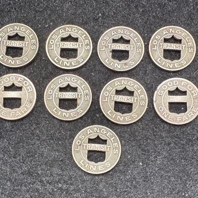 Sale Photo Thumbnail #426: Lot of 9 transit tokens. Slightly smaller than a US dime. Rare, in very good condition. The Los Angeles Transit Lines ran from 1944 until about 1963, using rail cars which were fully replaced by busses at that time. These tokens are likely from the mid 19