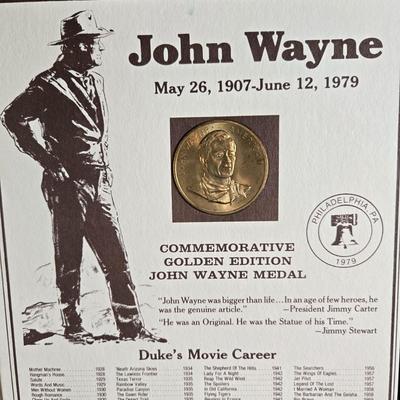 Sale Photo Thumbnail #112: This auction lot is for a Commemorative John Wayne Collector's Coin.  It is complete and has his history, certificate of authenticity and the coin.  The is coin is electroplated with 24 Karat Gold.  Registration number is JW 199065.  Where you gonna find 