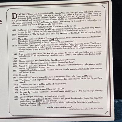 Sale Photo Thumbnail #114: This auction lot is for a Commemorative John Wayne Collector's Coin.  It is complete and has his history, certificate of authenticity and the coin.  The is coin is electroplated with 24 Karat Gold.  Registration number is JW 199065.  Where you gonna find 