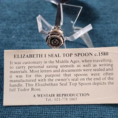 Sale Photo Thumbnail #125: This auction lot is for a Elizabeth I Seal Top Spoon Replica.  This is a nifty replica of the Queen Elizabeth I Seal Top Spoon.  It includes paperwork about it and is in it's original box.  Great addition for all Spoon or monarchy Collector.  Use it to se