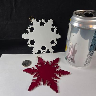 Sale Photo Thumbnail #129: This auction lot is for a Pair of Stained Glass Snowflakes. This is a beautiful Pair of Stained Glass Snowflakes.  They are hand-cut by a glass artist for the holidays.  The dark one is a great deep red and the white one has edges that are snowmen.  Both 