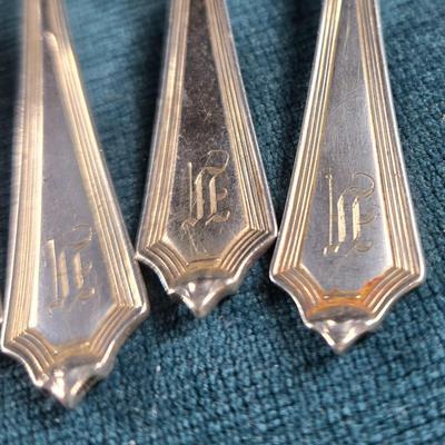 Sale Photo Thumbnail #137: This auction lot is for a Set of 6 Sterling Silver Teaspoons. These sterling silver teaspoons are pattern 1911 Plymouth by Gorham.  They have a monogram, which we believe to be an F on the handles - but it is very decorative and hard to discern..  They ar
