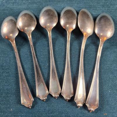 Sale Photo Thumbnail #138: This auction lot is for a Set of 6 Sterling Silver Teaspoons. These sterling silver teaspoons are pattern 1911 Plymouth by Gorham.  They have a monogram, which we believe to be an F on the handles - but it is very decorative and hard to discern..  They ar