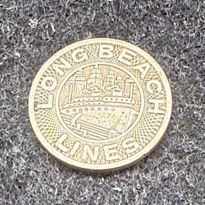 Sale Photo Thumbnail #432: Lot of 6 transit tokens. Slightly smaller than a US dime. Rare, in very good condition. The Long Beach Lines ran from 1902 until 1961, using Pacific Electric "Red Cars" which were fully replaced by busses in 1961. These tokens are likely from the mid 1940
