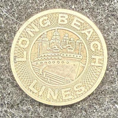 Sale Photo Thumbnail #434: Lot of 6 transit tokens. Slightly smaller than a US dime. Rare, in very good condition. The Long Beach Lines ran from 1902 until 1961, using Pacific Electric "Red Cars" which were fully replaced by busses in 1961. These tokens are likely from the mid 1940