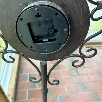 Metal standing clock