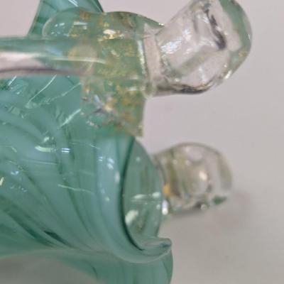 Sale Photo Thumbnail #989: The green vase has a shape edge on the top of the handle.  It is not chipped appears to be made that way