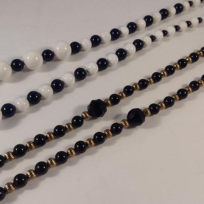 Sale Photo Thumbnail #1113: Pair of Bead Necklaces (#11)