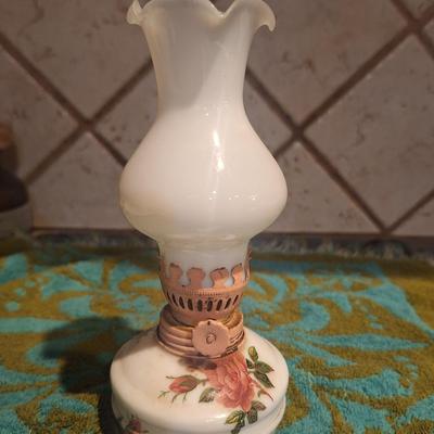 small oil lamp with pink rose