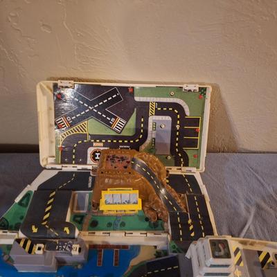 Sale Photo Thumbnail #273: it is old and has been played with a lot but it folds out and rolls fine.  See all photos.  We don't have any micromachines to go with it.