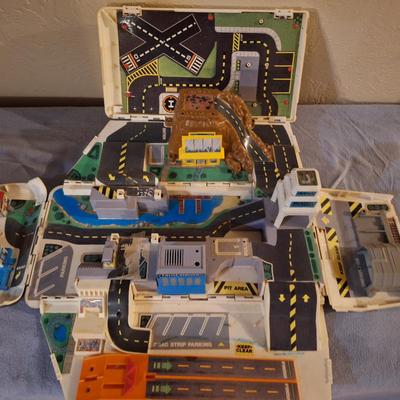 Sale Photo Thumbnail #272: it is old and has been played with a lot but it folds out and rolls fine.  See all photos.  We don't have any micromachines to go with it.