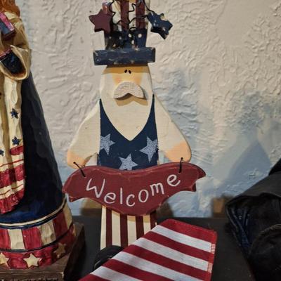 Sale Photo Thumbnail #280: patriotic figurines- statue of liberty has a broken arm.