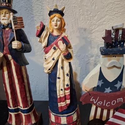 Sale Photo Thumbnail #279: patriotic figurines- statue of liberty has a broken arm.