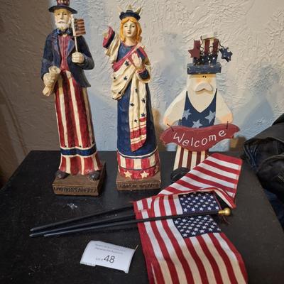 Sale Photo Thumbnail #276: patriotic figurines- statue of liberty has a broken arm.