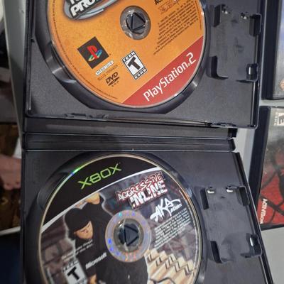 Sale Photo Thumbnail #410: Playstation2 games- the two bottom games are in the wrong cases
