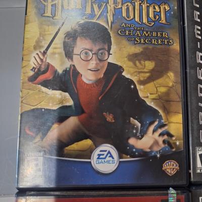 Sale Photo Thumbnail #408: Playstation2 games- the two bottom games are in the wrong cases