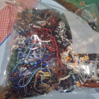 Sale Photo Thumbnail #480: bag of jewelry pieces, broken jewelry mismatched earrings etc  weighs over 3 pounds