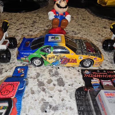 Sale Photo Thumbnail #152: Rare Zelta N64 Diecast Racecar along with other Nintendo memorbilia.