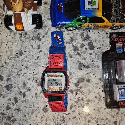Sale Photo Thumbnail #151: Rare Zelta N64 Diecast Racecar along with other Nintendo memorbilia.