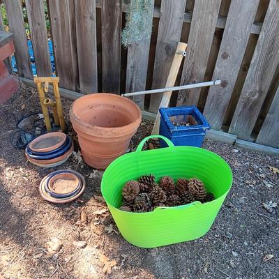PINECONES, CLAY FLOWER POTS, WATER FOUNTAIN TOPS AND MANY POT SAUCERS
